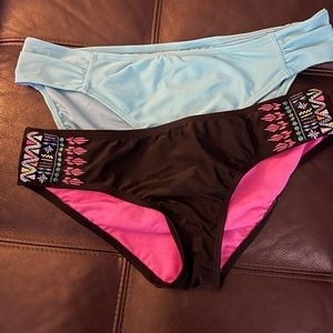 Lot if two swim bottoms